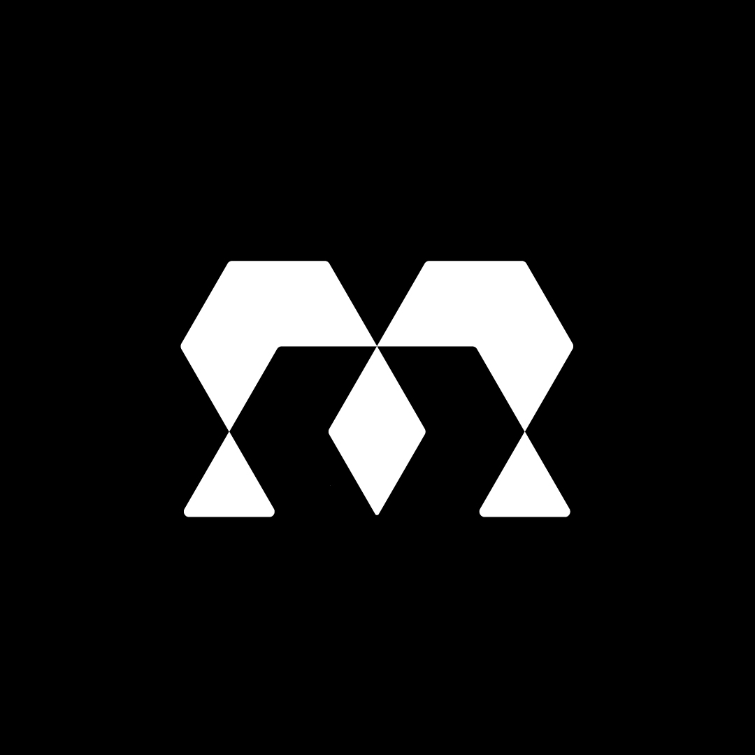 Diamond M Logo on Dark Background